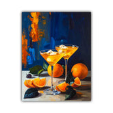 A still life painting of two orange cocktails in martini glasses, with whole and sliced oranges, dark green leaves, and a dark blue and orange painted background, shown as a square canvas print on a white background.