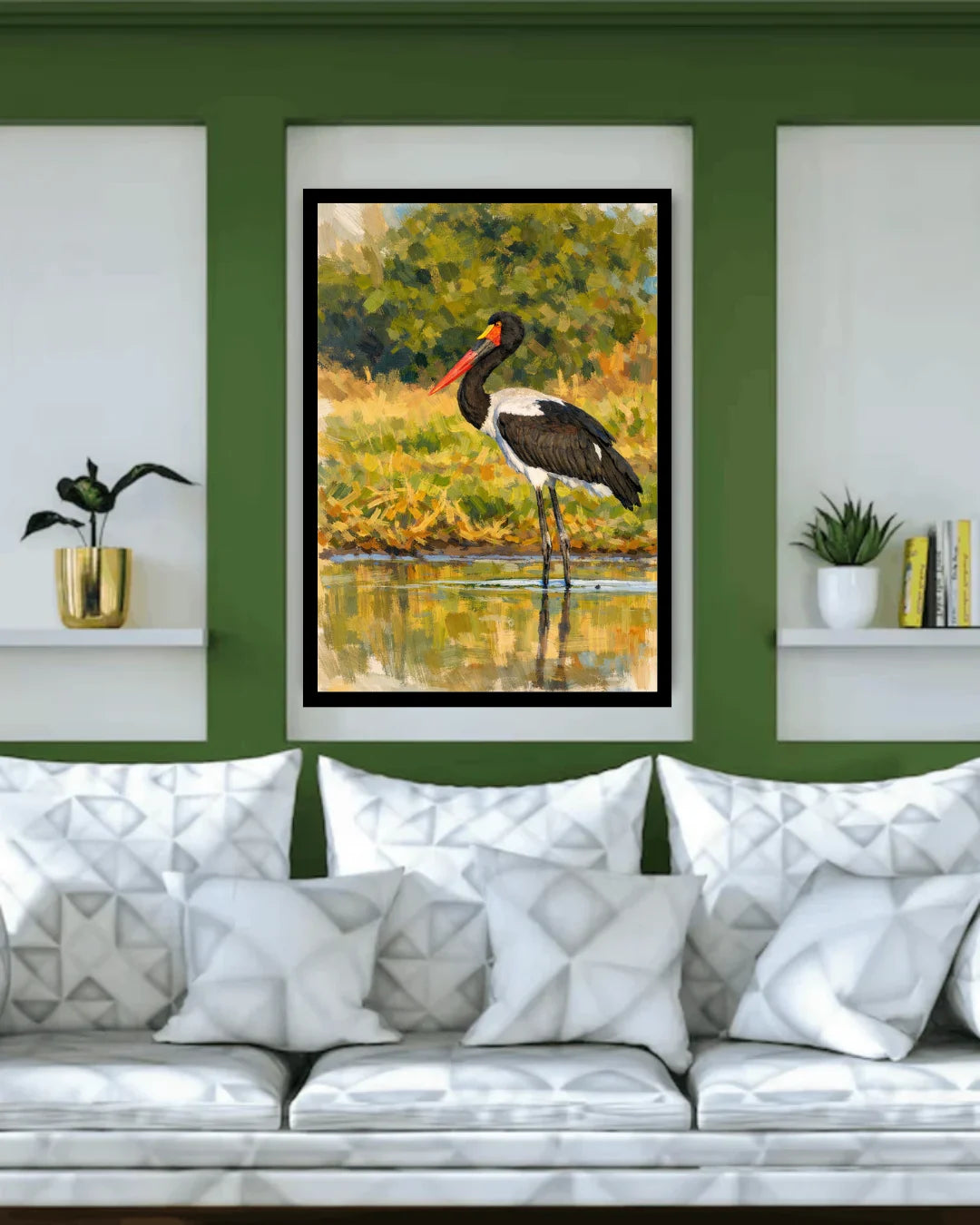 Framed artwork of a bird on a wall above a sofa with decorative pillows.