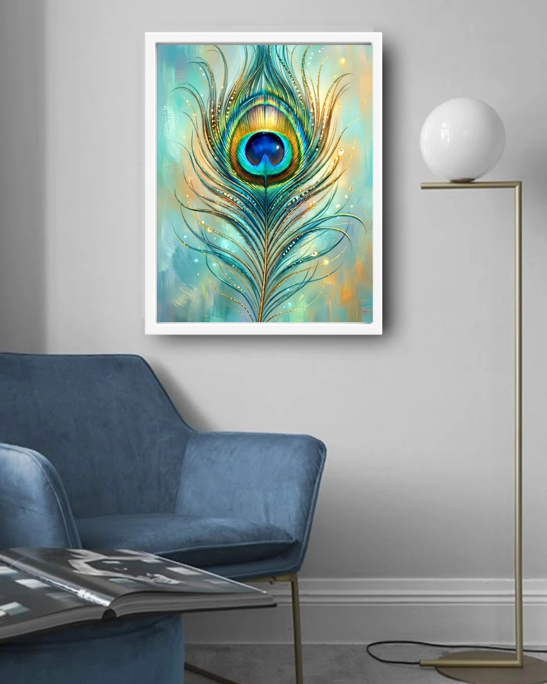 Framed artwork of a peacock feather on a wall above a blue armchair.