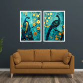 Two framed paintings of peacocks on a wall above a brown sofa.