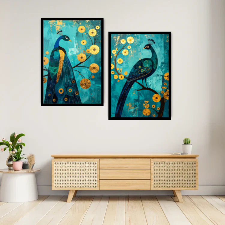Two framed paintings of peacocks on a wall above a wooden console table.