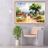 Framed painting of a village scene on a wall above a chair and plant.