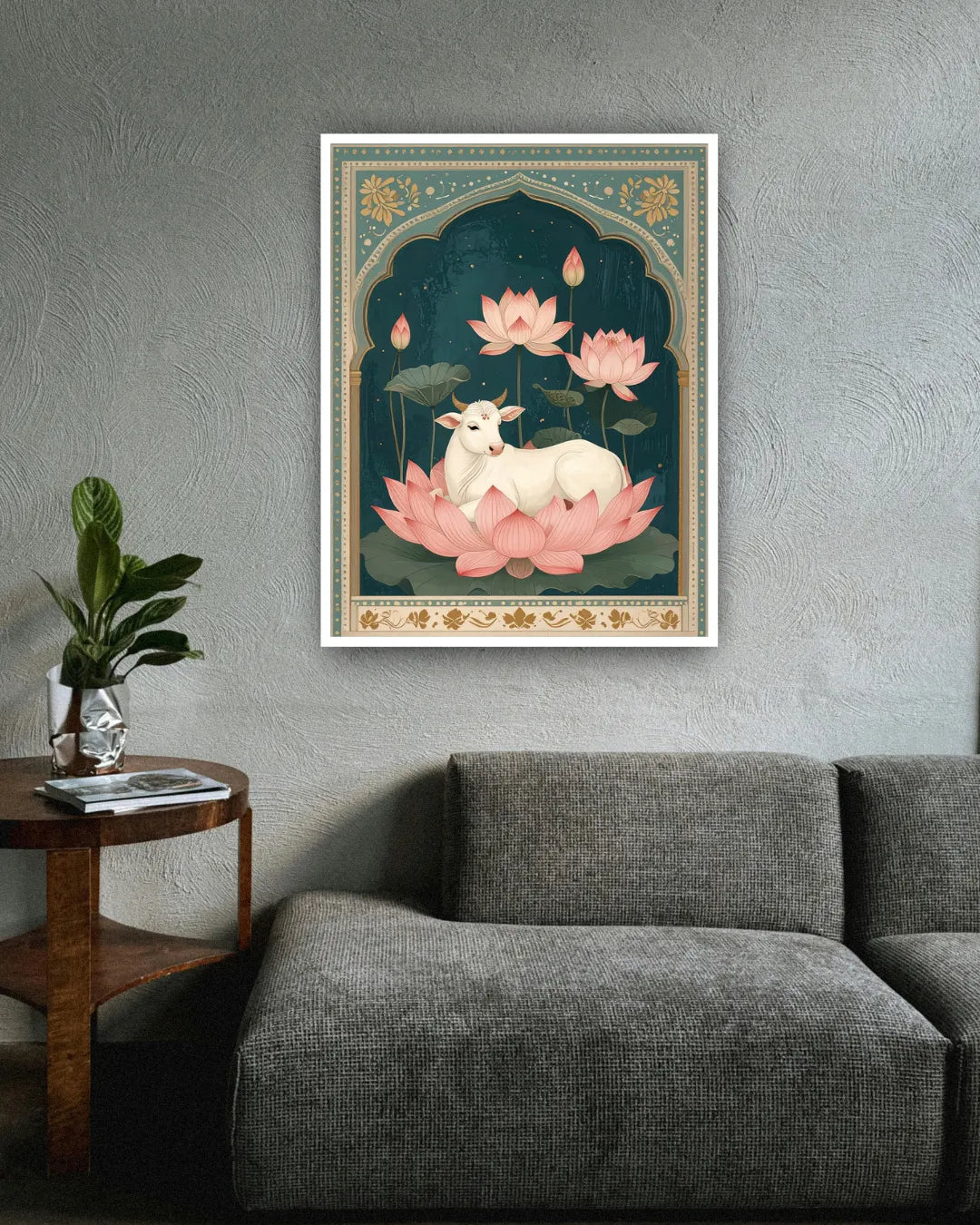 Pink lotus floral wall art canvas displayed above a grey sofa in a modern living room
