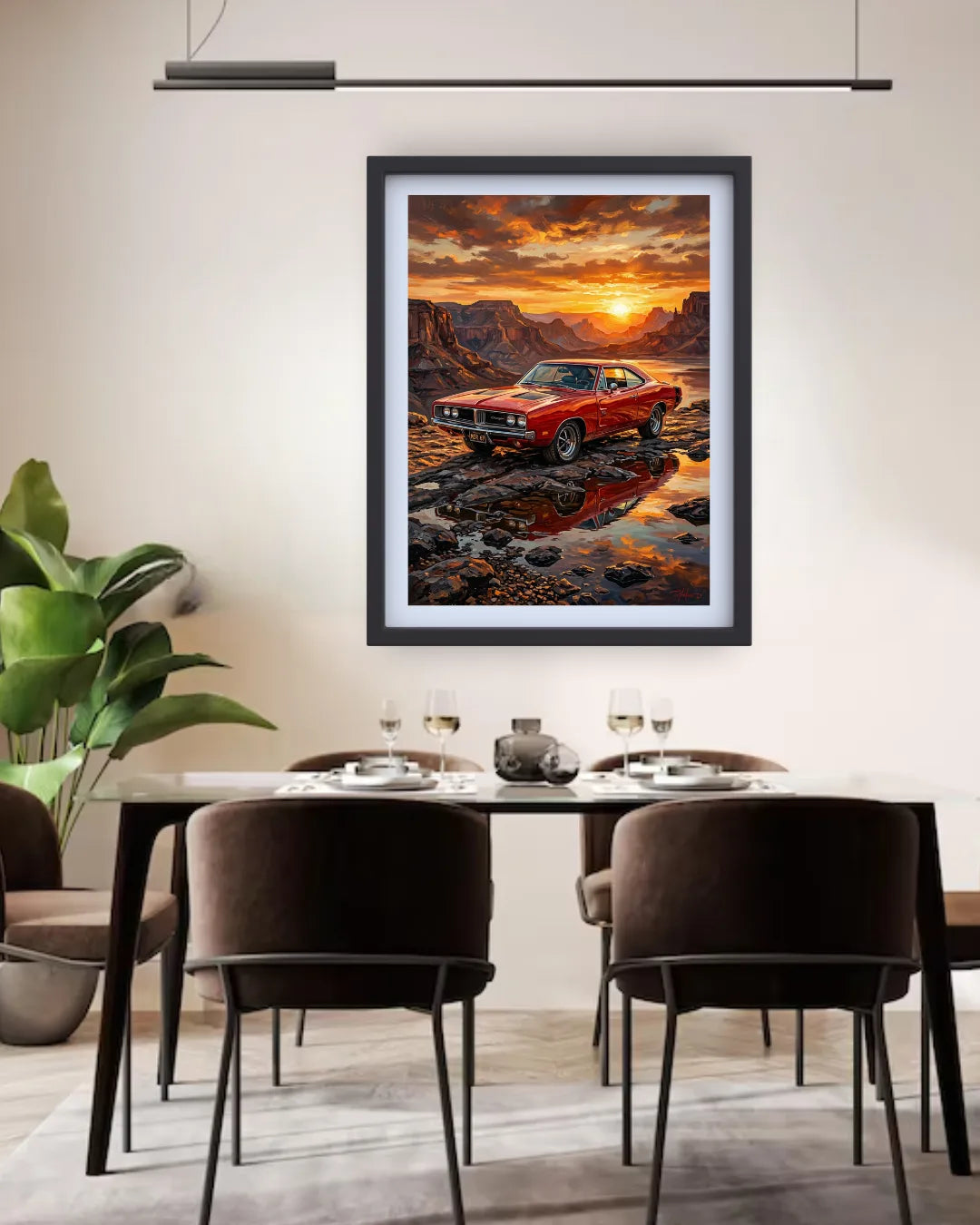 Framed artwork of a red car at sunset over water in a dining room.