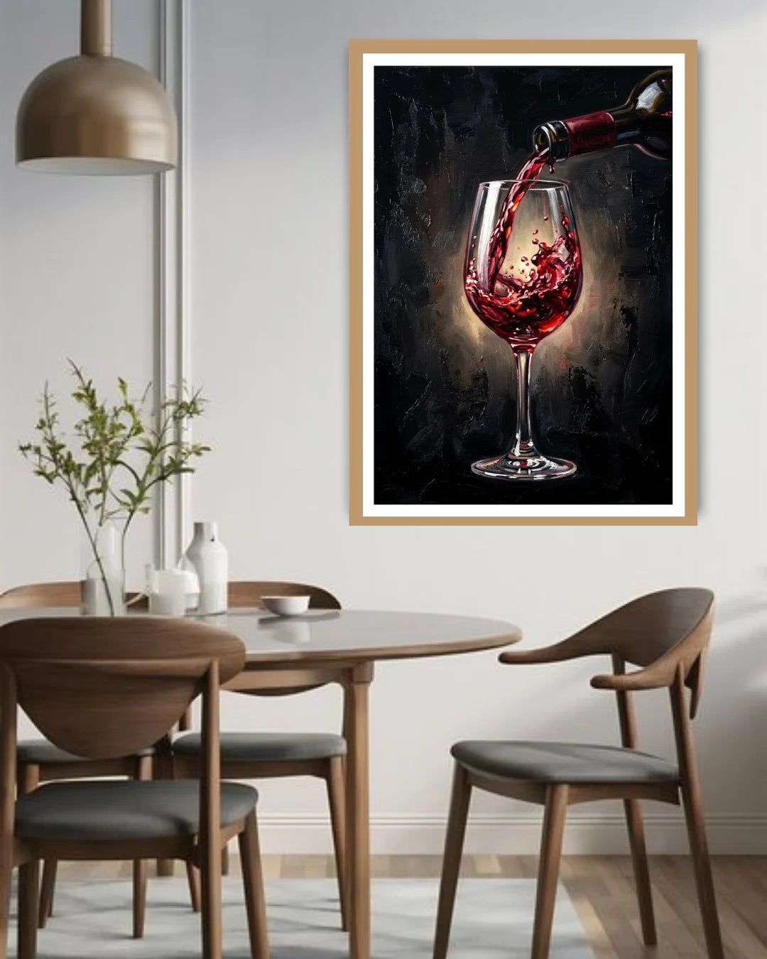 Framed artwork of red wine being poured into a glass above a dining table.