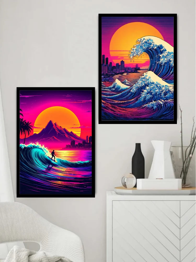 Two framed retro-style wave art prints hang on a white wall above a white cabinet with decorative vases. The prints feature neon purple, pink, orange, and blue ocean waves with a sunset and city skyline.