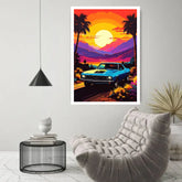 A framed wall art print featuring a retro blue muscle car on a sunset road with palm trees and mountains, displayed in a modern living room above a tufted chair and beside a small side table.