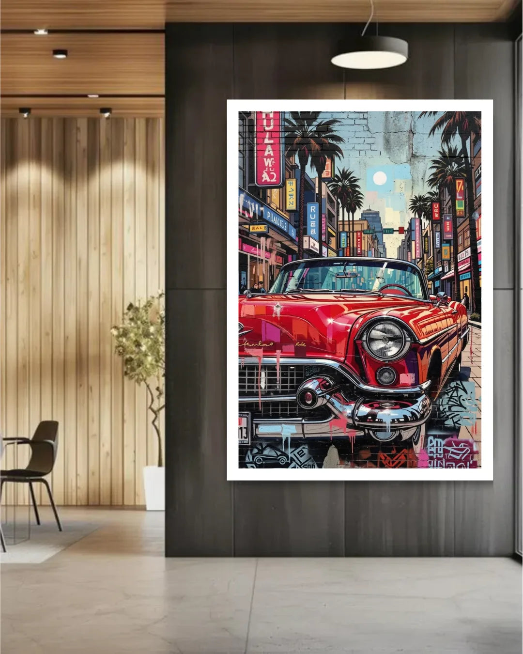Framed artwork of a red classic car in an urban setting on a wall.