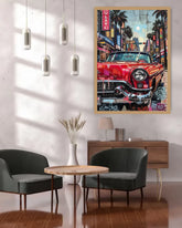 Framed artwork of a red car on a city street in a modern living room.