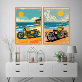 Two framed vintage-style beach motorcycle posters displayed side by side on a light gray wall above a white console table with decorative vases, candles, and a lamp.
