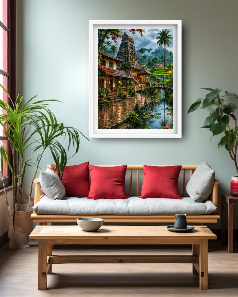 A framed art print depicting a scenic temple and canal landscape in Sri Lanka, displayed on a light green wall above a wooden sofa with red and gray pillows in a modern living room setting.