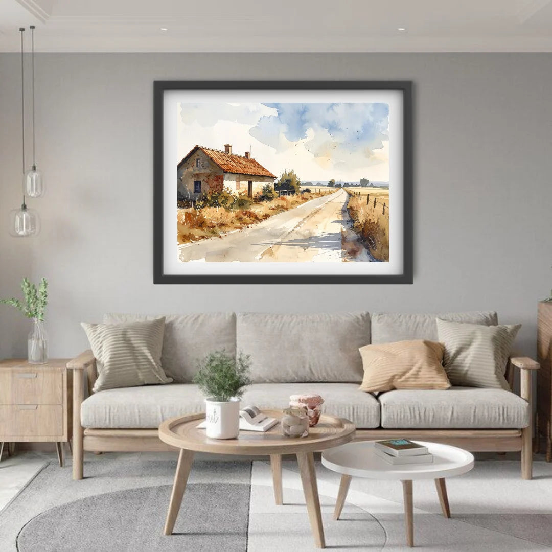 Living room with a framed landscape painting on the wall above a sofa.