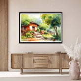 Framed painting of a rustic scene on a wall above a wooden cabinet.