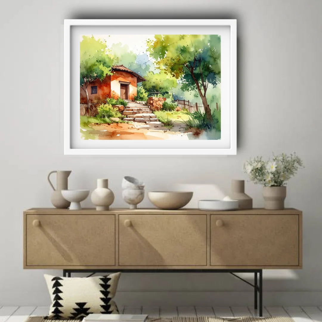 Framed landscape painting above a wooden console table with decorative items.