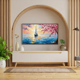Modern living room with a decorative painting of a sunset and cherry blossoms on a wall.