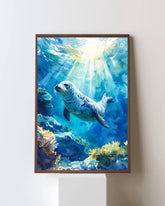 Framed artwork of a seal underwater with sunlight filtering through the water.