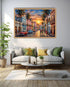 A framed canvas print of a colorful street scene in Havana, featuring palm trees, vintage cars, and a sunset, displayed on a white wall above a modern sofa in a living room setting.