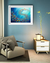 Elegant underwater fish canvas artwork displayed in a contemporary lounge with modern furnishings.