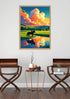 A framed art print depicting a vibrant sunset landscape with a horse standing in a reflective pond, displayed on a light gray wall above a small side table between two wooden chairs.