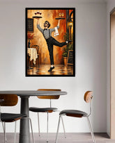 A framed wall art print depicting a waiter in a restaurant scene, hung on a light gray wall above a dining table and chairs.