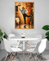 A framed wall art print depicting a lively wine server in a restaurant, displayed above a modern white dining table and chairs in a bright, contemporary room.