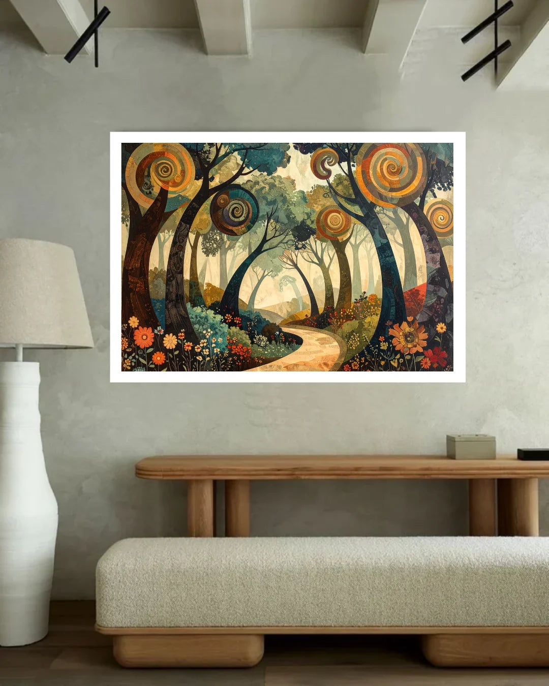 A framed art print depicting a whimsical forest path with swirling tree trunks and colorful flowers, displayed on a textured gray wall above a wooden bench in a modern living room setting.