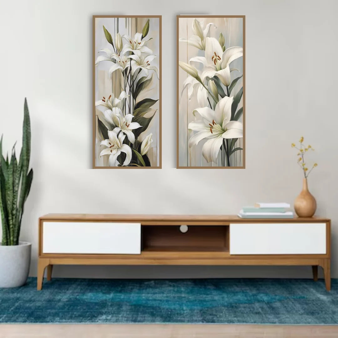 White lily floral wall art canvas set displayed above a bed in a minimalist bedroom
