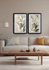 Neutral living room decorated with white lily floral wall art canvas set above sofa
