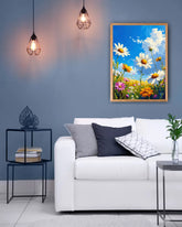 Living room with a white sofa, decorative pillows, and a framed floral painting on the wall.