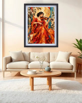 A framed vertical art print depicting a woman in a flowing red dress playing the violin, displayed on a beige wall above a modern white sofa in a bright living room.