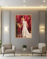 A framed art print depicting a woman in a white gown beside a martini glass, displayed on a gray wall in a modern living room setting with two beige armchairs and a small side table.